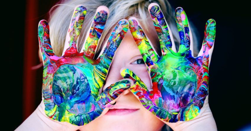 Children - A KId With Multicolored Hand Paint